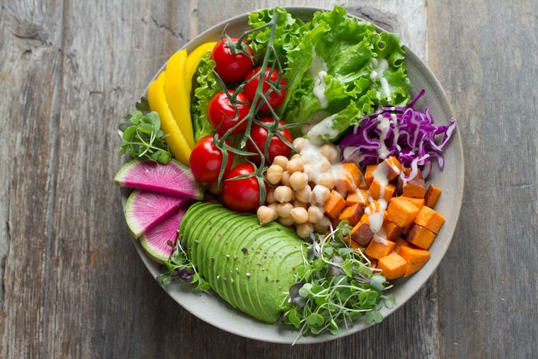 Rainbow lentil bowl with greens and vegetables