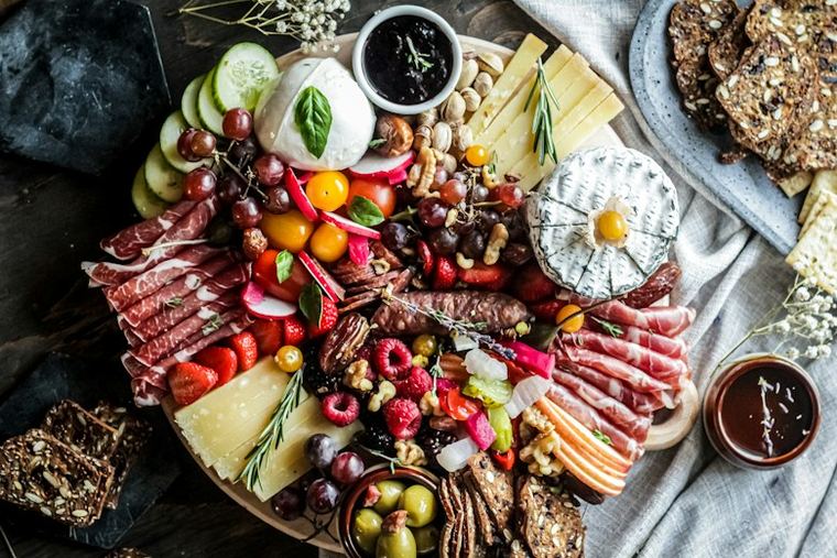 Weeknight sharing platter with cheeses, fruits, nuts, and dips